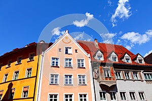 Colorful tenement houses with attics photo