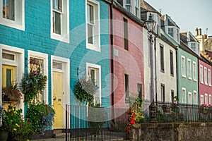 Colorful Terrace Houses and Hanging Baskets on a Street in South Queensferry, Scotland