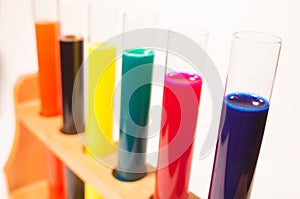 colorful test tubes filled with fluids