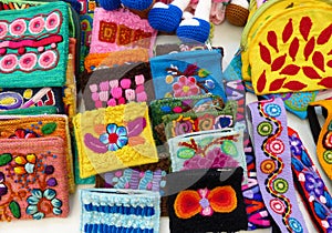 Colorful textile embroidered purses from Peru