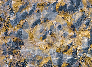 Colorful texture of mining spoil heaps at abandoned pyrite mine, view directly above