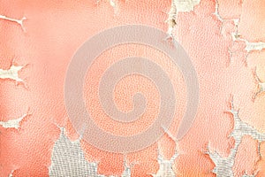 Colorful texture of old red leather with ripped patterns texture for background, hole and white threads destroyed on chair