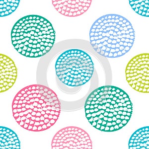 Colorful textured circle seamless pattern, blue, pink, green round grunge polka dot, wrapping paper.