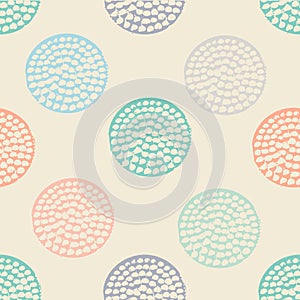 Colorful textured circle seamless pattern, blue, pink, orange, beige round grunge polka dot, wrapping paper.