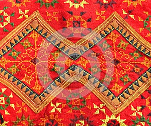 Colorful Thai fabric pattern.