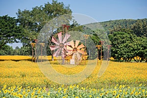 Colorful thai fabric windmill and kite at spring farm. Thailand