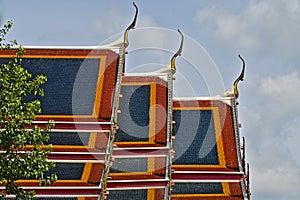 Colorful Thai temple roofs at What Pho temple