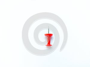 Colorful thumbtack againts white background