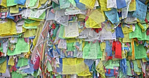 Colorful Tibetan prayer flags swaying in the wind in the temple, Ulan Ude Russia