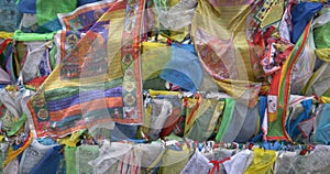 Colorful Tibetan prayer flags swaying in the wind in the temple, Ulan Ude Russia