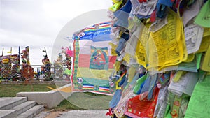 Colorful Tibetan prayer flags swaying in the wind in the temple, Ulan Ude Russia