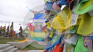 Colorful Tibetan prayer flags swaying in the wind in the temple, Ulan Ude Russia