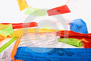 Colorful Tibetan Sanskrit banners with religious prayers