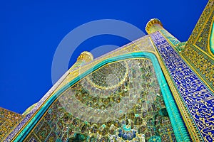 The colorful decoration of Shah Mosque in Isfahan, Iran photo