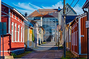 Colorful timber houses in Neristan district of Finnish town Jako
