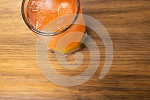 Colorful toned cocktails on wooden background. Frutal alcoholic cocktails. Colorful drinks concept