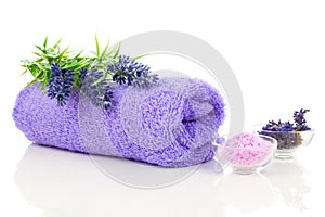 Colorful towel with lavender flower and aromatic bath salt