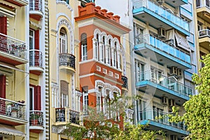 Colorful townhouse facades of historic and modern residential houses in the city center of Thessaloniki, Greece