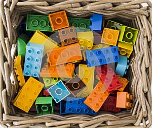 Colorful toy bricks on white background