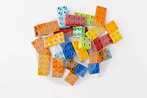Colorful toy bricks on white background
