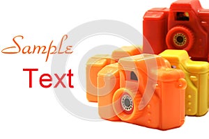 Colorful Toy Cameras with copy space