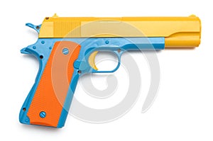 A colorful toy pistol hand gun