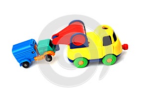 The colorful toy trail truck dragging