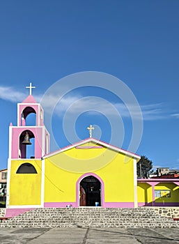 Colorful, tradicional yellow and pink church in Raices, Mexico photo