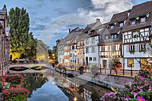 Colorful traditional french houses on the side of river