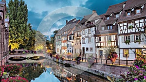 Colorful traditional french houses on the side of river