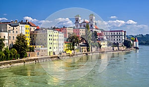 Colorful traditional houses on Inn river in historical old town Passau, Germany