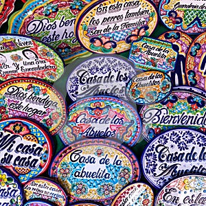 Colorful traditional Mexican pottery. Talavera style. Souvenirs on sale in local market of Puebla, Mexico