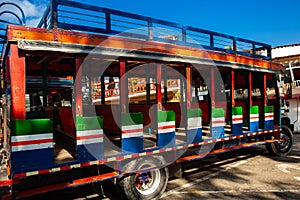 Colorful traditional rural bus from Colombia called chiva photo