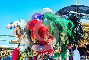 Colorful traditional venetian carnival masks vendor display