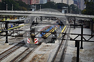 A colorful train on tracks in downtown Chicago, Illinois.