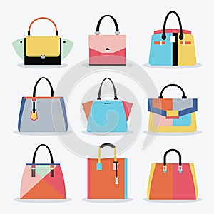 Colorful and trendy women handbags and purse set on white background
