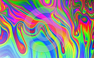 Colorful, trippy psychedelic abstract in blue, green, pink and red