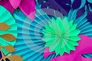 Colorful tropical paper flower background. multicolored Flowers and leaves made of paper