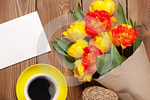 Colorful tulips, greeting card and coffee