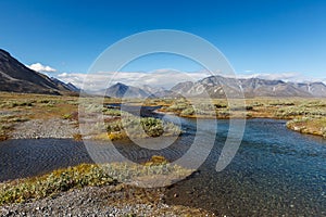 Colorful tundra in front of the river and