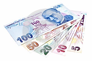 Colorful Turkish banknotes over white
