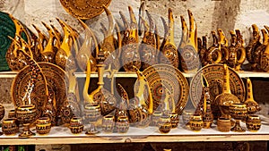 Colorful Turkish traditional ceramic handycrafts in a local pottery shop in Cappadocia photo