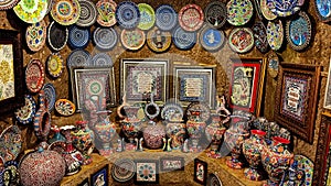 Colorful Turkish traditional ceramic handycrafts in a local pottery shop in Cappadocia photo