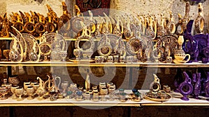 Colorful Turkish traditional ceramic handycrafts in a local pottery shop in Cappadocia photo