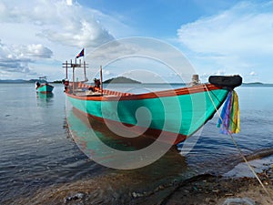 Colorful Turquois Boat near the Cambodia Vietnam Border