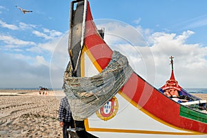 Colorful typical Boat on the beach of Torreira