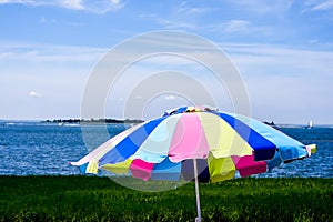 Colorful umbrela on nice sunny day near ocean