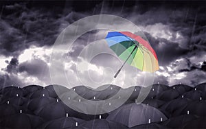 Colorful Umbrella and Black Umbrellas - Being Different Concept