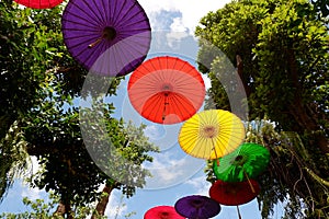 Colorful Umbrella floating in the sky