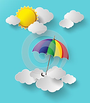 Colorful umbrella flying high in the air